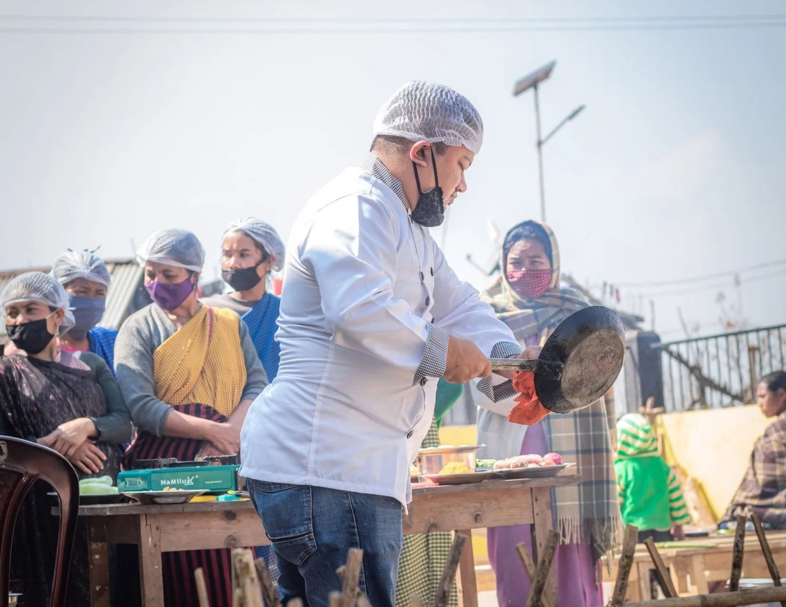 A Mid-Day Meal cooking demonstration.